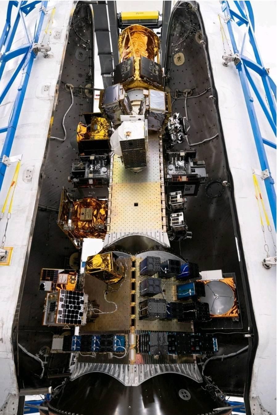 The packed Falcon 9 fairing carrying the Transporter-12 rideshare payloads, LOGSATS-2 among them